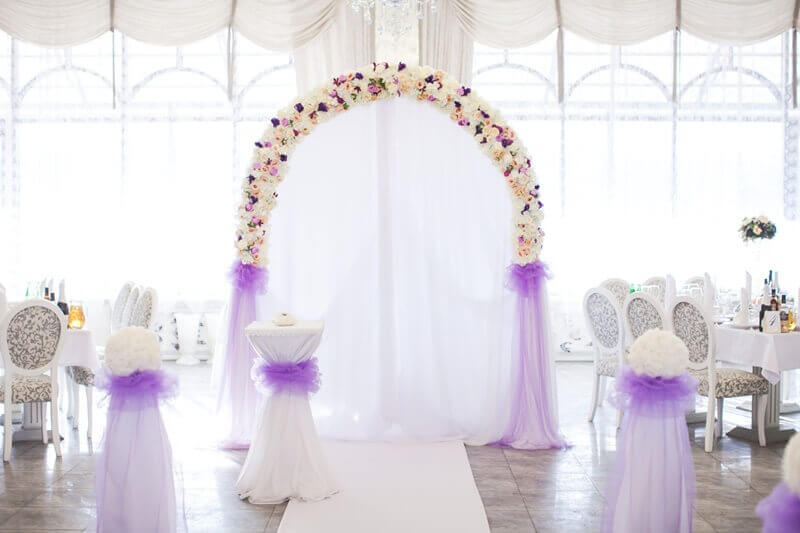 Alluring Aisle Décor Using Wedding Arch, Tulle Fabric, Organza Fabric, Aisle Runner & Flower Balls