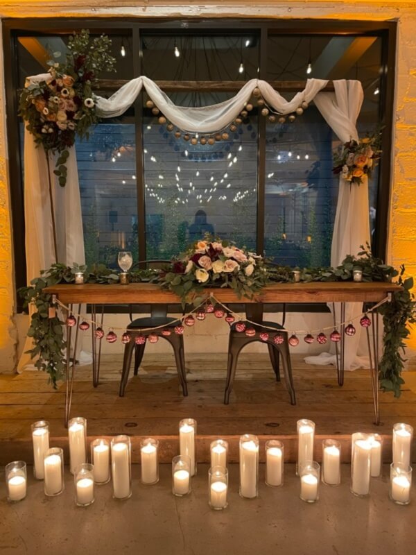 Lavish Sweetheart Table Setup With Backdrop Stand, Drapery Fabric, Flowers, Vines, Vases, & Candles